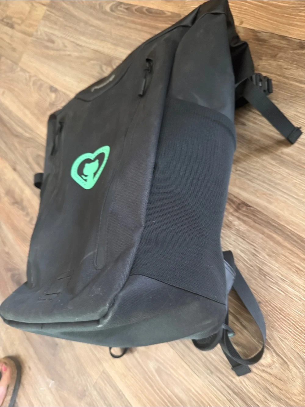 MiiR Black Roll-Top Backpack with Teal Heart Accent, recycled fabric